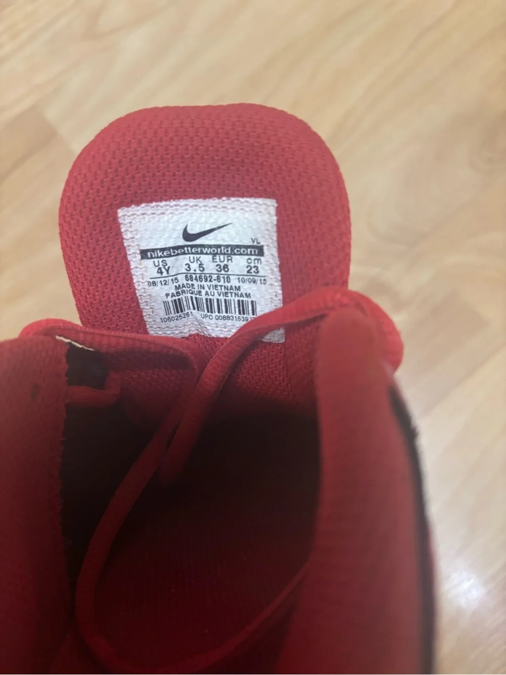 Nike Red Athletic Trainer with White Swoosh Accent Cleats